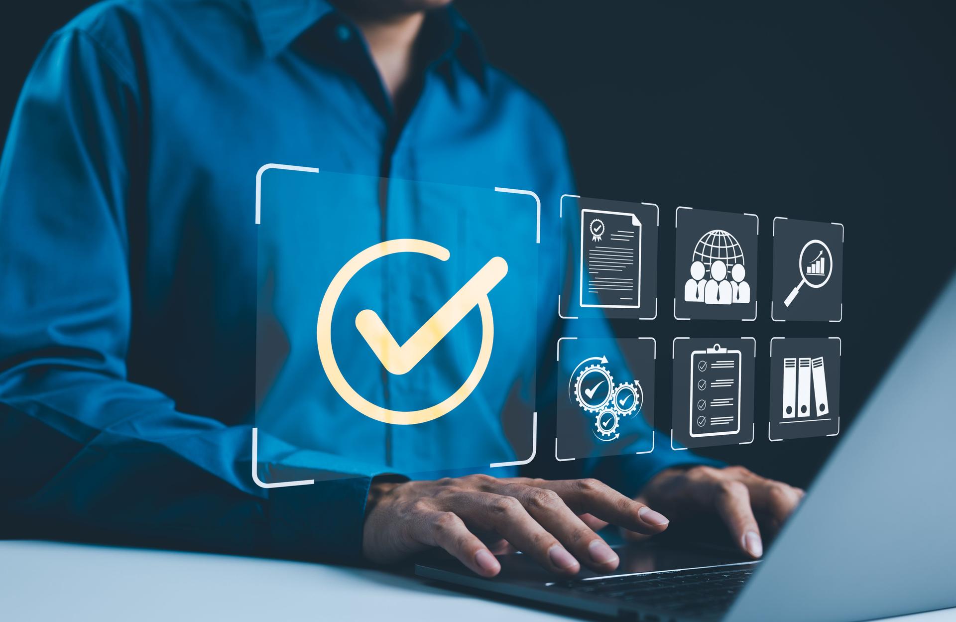 Nonprofit compliance professional reviewing documents and digital filings for 501(c)(3) organizations