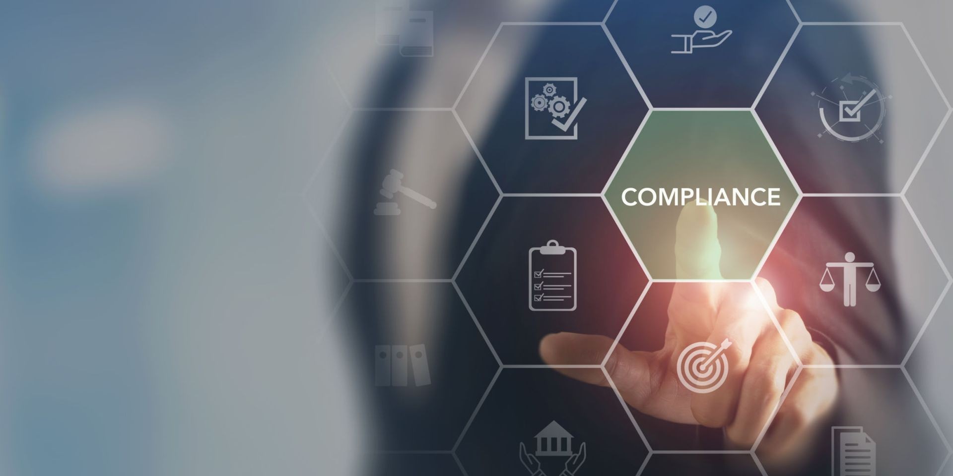 Business professional selecting compliance icon on virtual screen with legal and regulatory symbols.