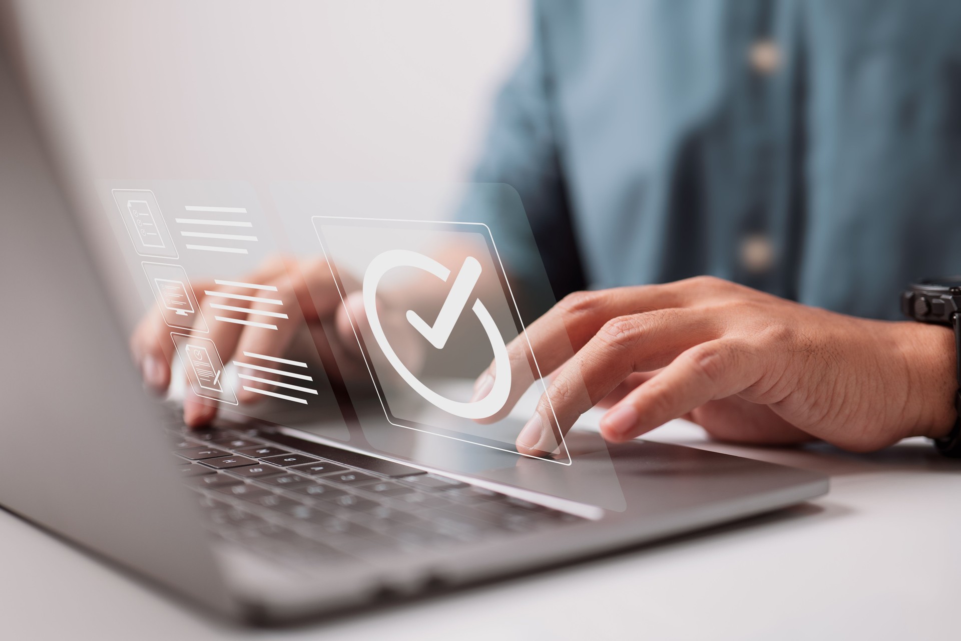 Nonprofit administrator filing IRS Form 990 on a laptop for annual tax compliance